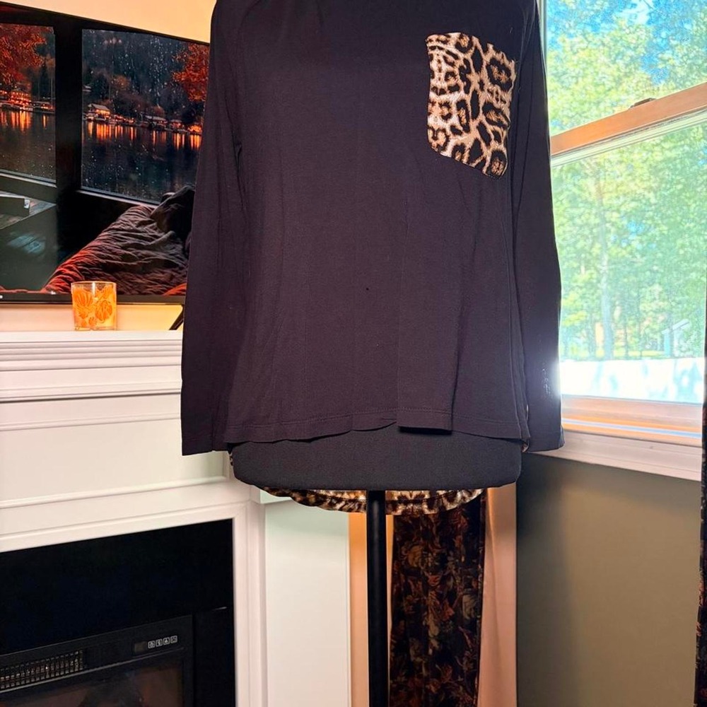 Venus Leopard and black top